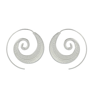 Boucle d'oreille ronde à grande spirale type bohème.